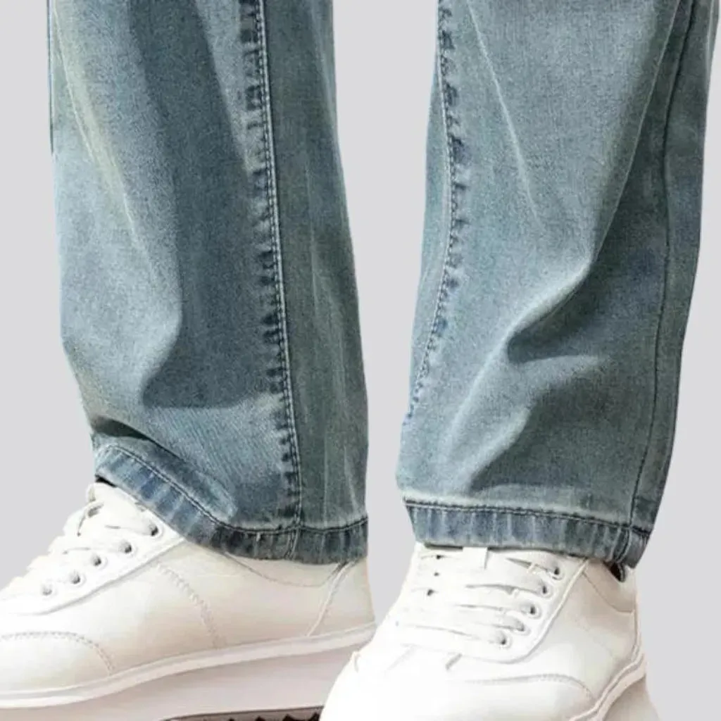 Thin men's stretch jeans