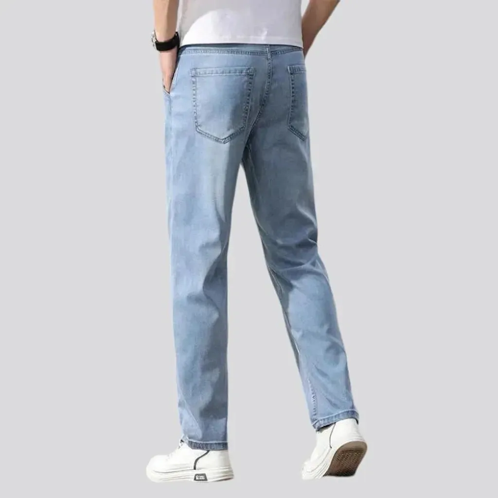 Thin men's stretch jeans